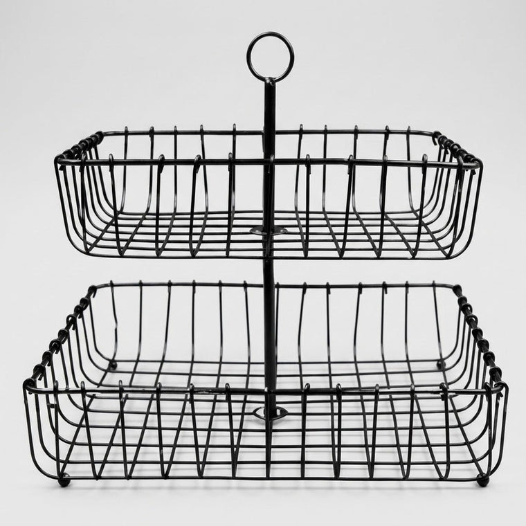 A two-tier black wire metal basket with a central handle, shown on a light gray background