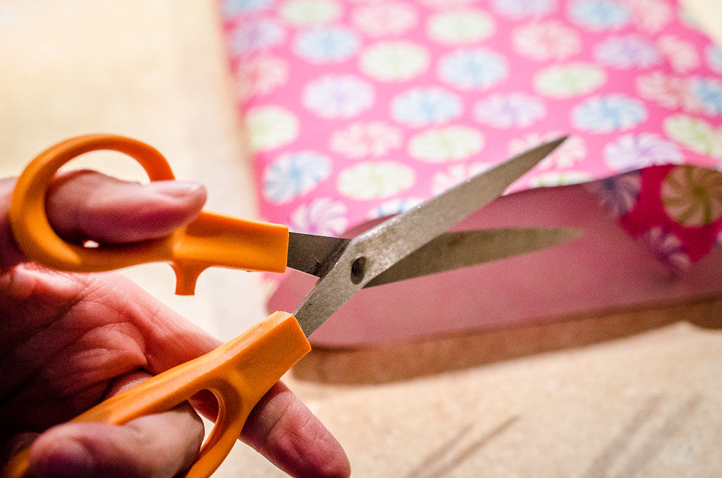 sharp knife cutting paper