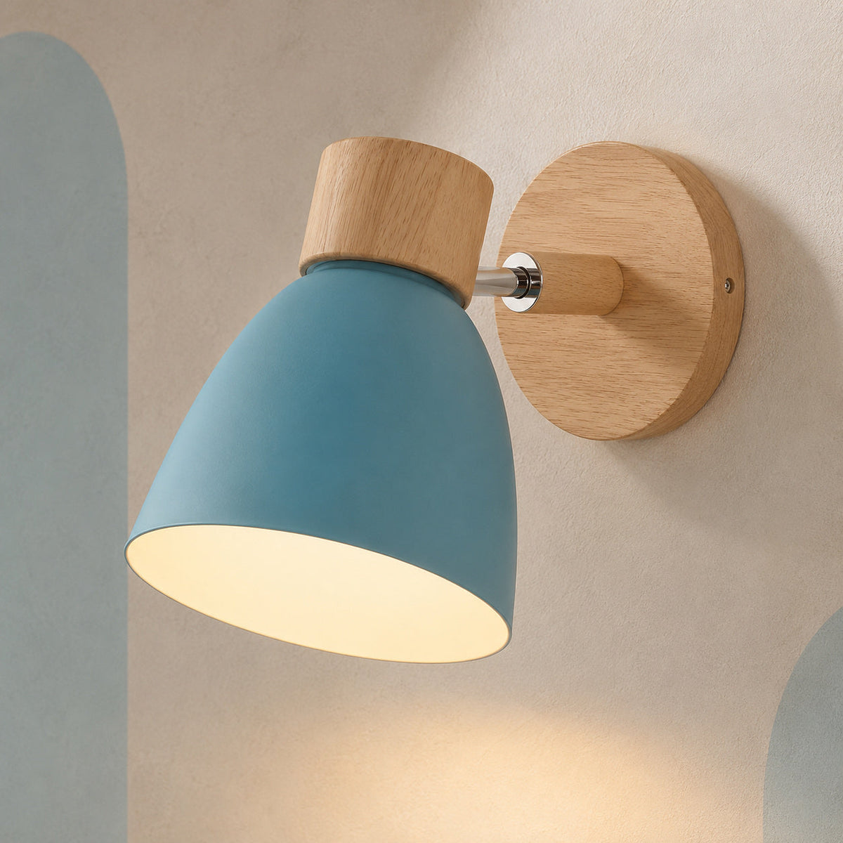 Blue bell wall lamp with rubberwood base lit on a cream wall