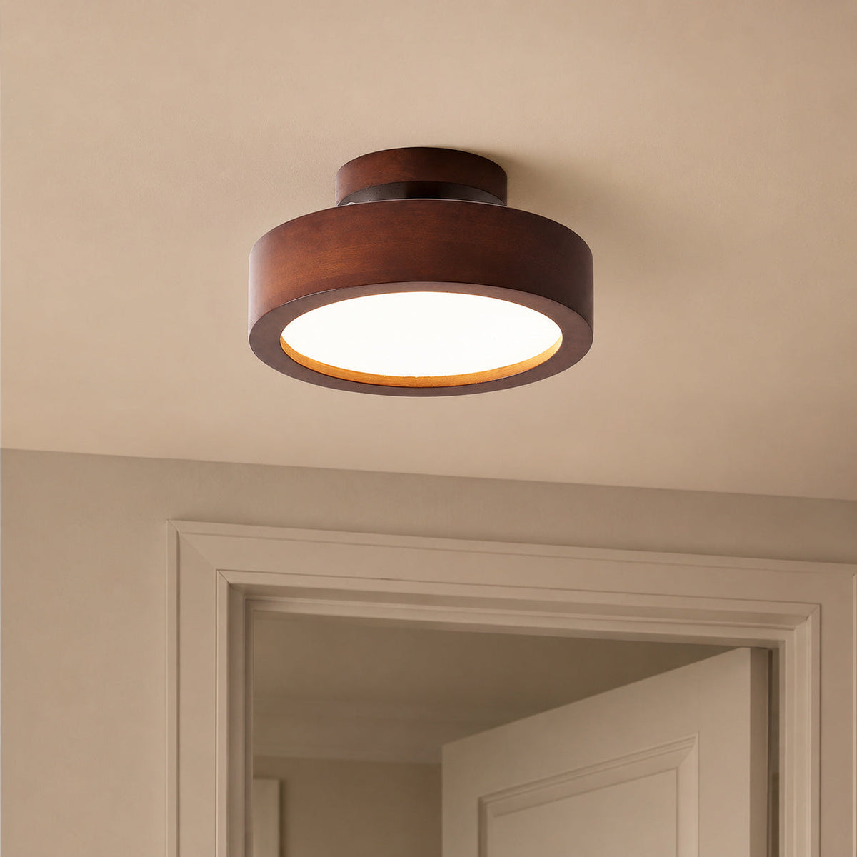 [thehouseland] best wood flush mount ceiling light - Wood flush mount ceiling light near a door frame, switched on warm glow