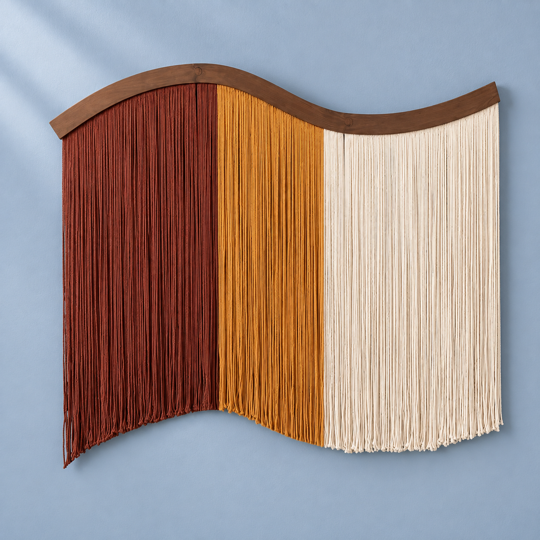 Brown studio on blue, color block fringe curtain, twisted cord, dark stained wave-cut board