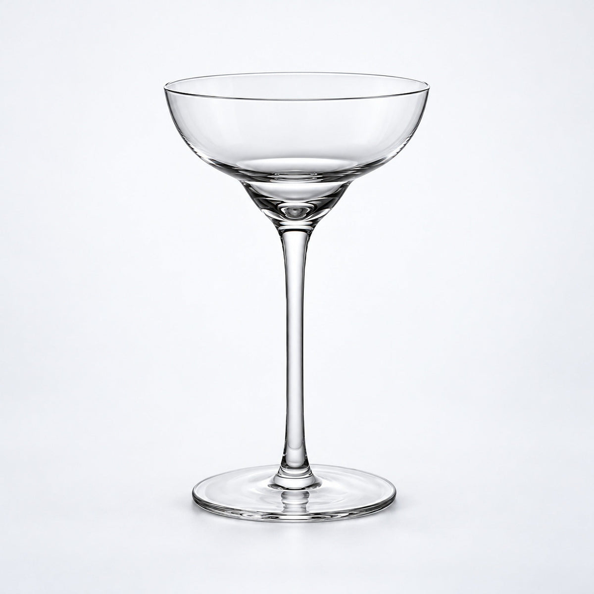 Empty 140 ml tall-stem rounded coupe glass