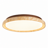 A modern flush-mount ceiling light fixture featuring a textured beige stone or travertine ring, a warm brown wood top plate, and a glowing warm white circular diffuser, shown against a solid white background.