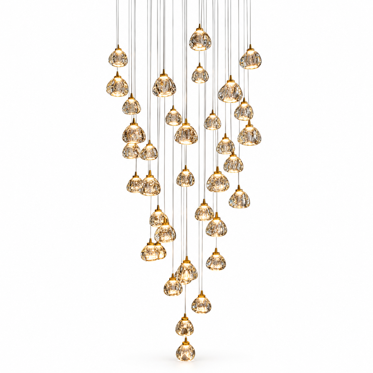 A modern multi-light pendant chandelier with multiple teardrop-shaped clear glass droplets featuring a gold crackle or textured finish, suspended from thin cables in a cascading, V-shaped arrangement against a solid white background.