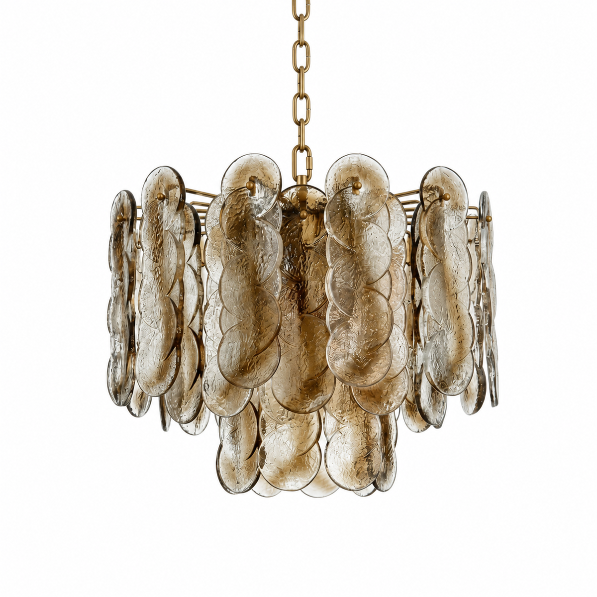 A modern multi-light chandelier featuring textured, translucent amber glass disc elements that form a layered, cloud-like cylinder, suspended from a gold-toned chain against a solid white background.