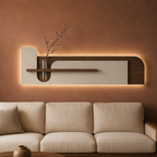 Cream backlit stone-textured wall panel with shelf and glass bud vase, warm LED backlight on