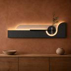Charcoal / Arch backlit curved wall panel with shelf and glass bud vase, warm LED backlight on