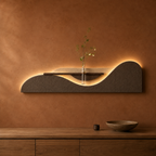 Mocha / Wave backlit curved wall panel with shelf and glass bud vase, warm LED backlight on