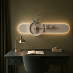 Walnut oval backlit wall panel lit above the furniture in a writing room