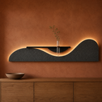 Charcoal / Wave backlit curved wall panel with shelf and glass bud vase, warm LED backlight on