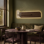 Cream backlit stone-textured wall panel lit above the furniture in a breakfast room