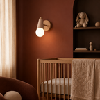 Vanity Sconce with Exposed Globe Bulb, Adjustable Iron Wall Lamp, 5 Colors in a nursery
