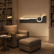 Charcoal / Arch backlit curved wall panel lit above the furniture in a library