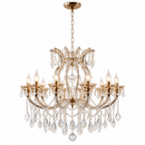An ornate six-light crystal chandelier with a polished gold-tone metal frame and hanging clear glass prisms, shown against a plain white background.