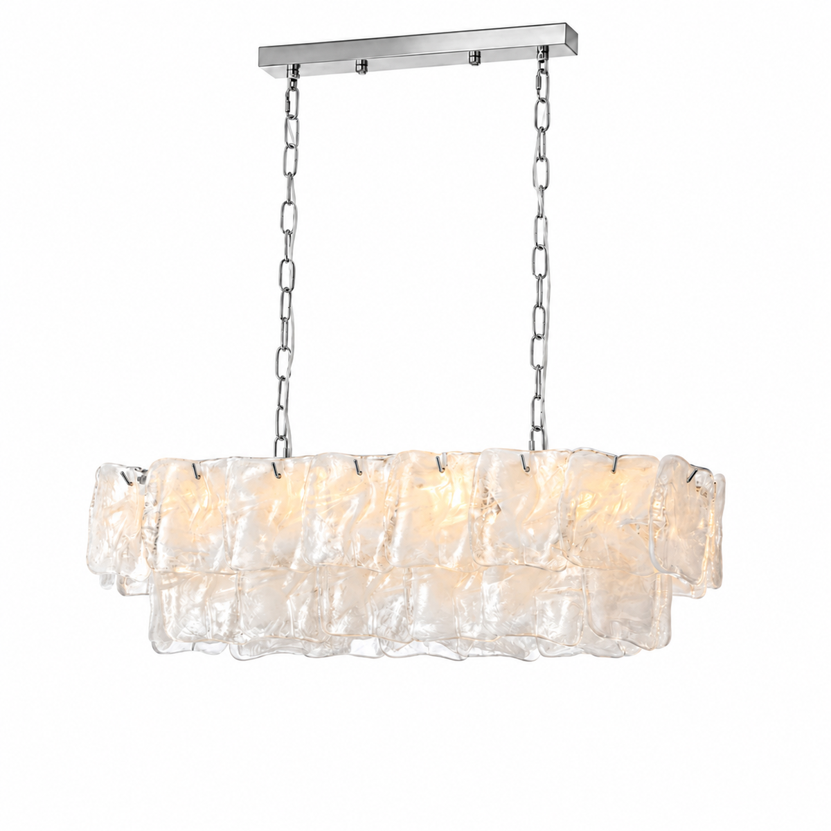 A linear chandelier with two tiers of clear textured glass hangs from silver chains against a white background.