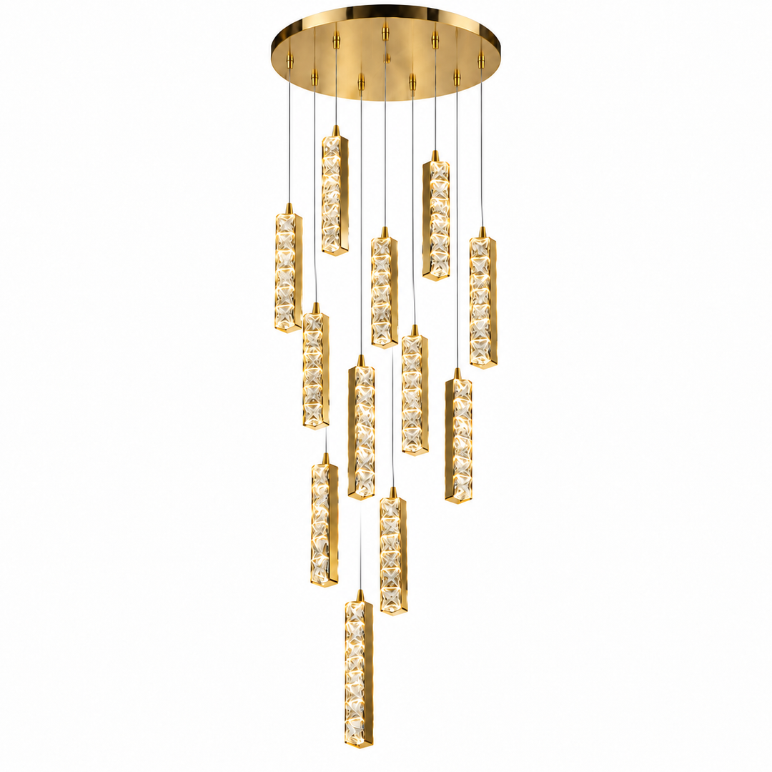 A modern multi-light linear chandelier with a brushed gold circular canopy and nine cascading cylindrical crystal prisms on a white background.