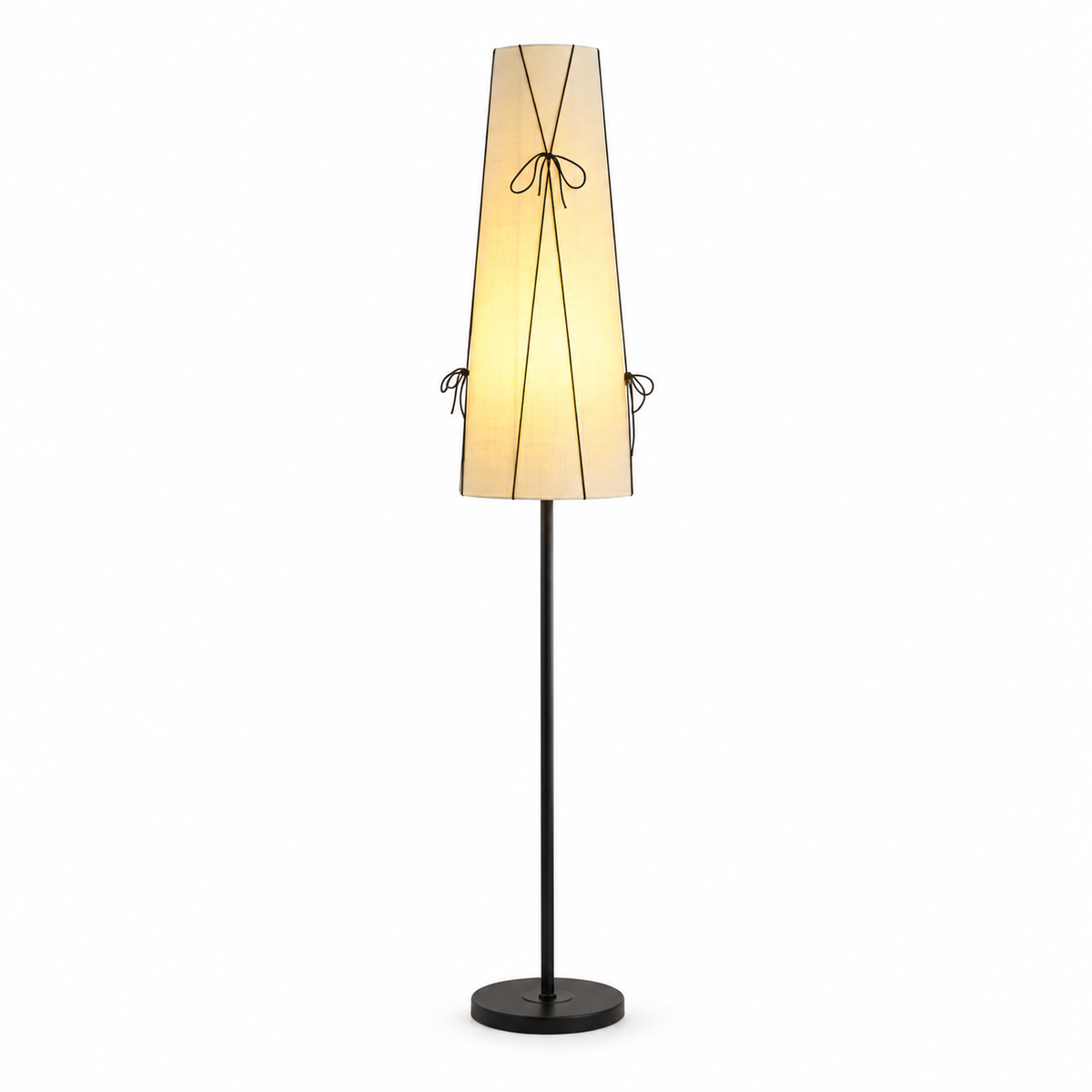 A modern floor lamp with a tapered beige fabric shade, black metal frame details, and a black stand base, shown against a plain white background.