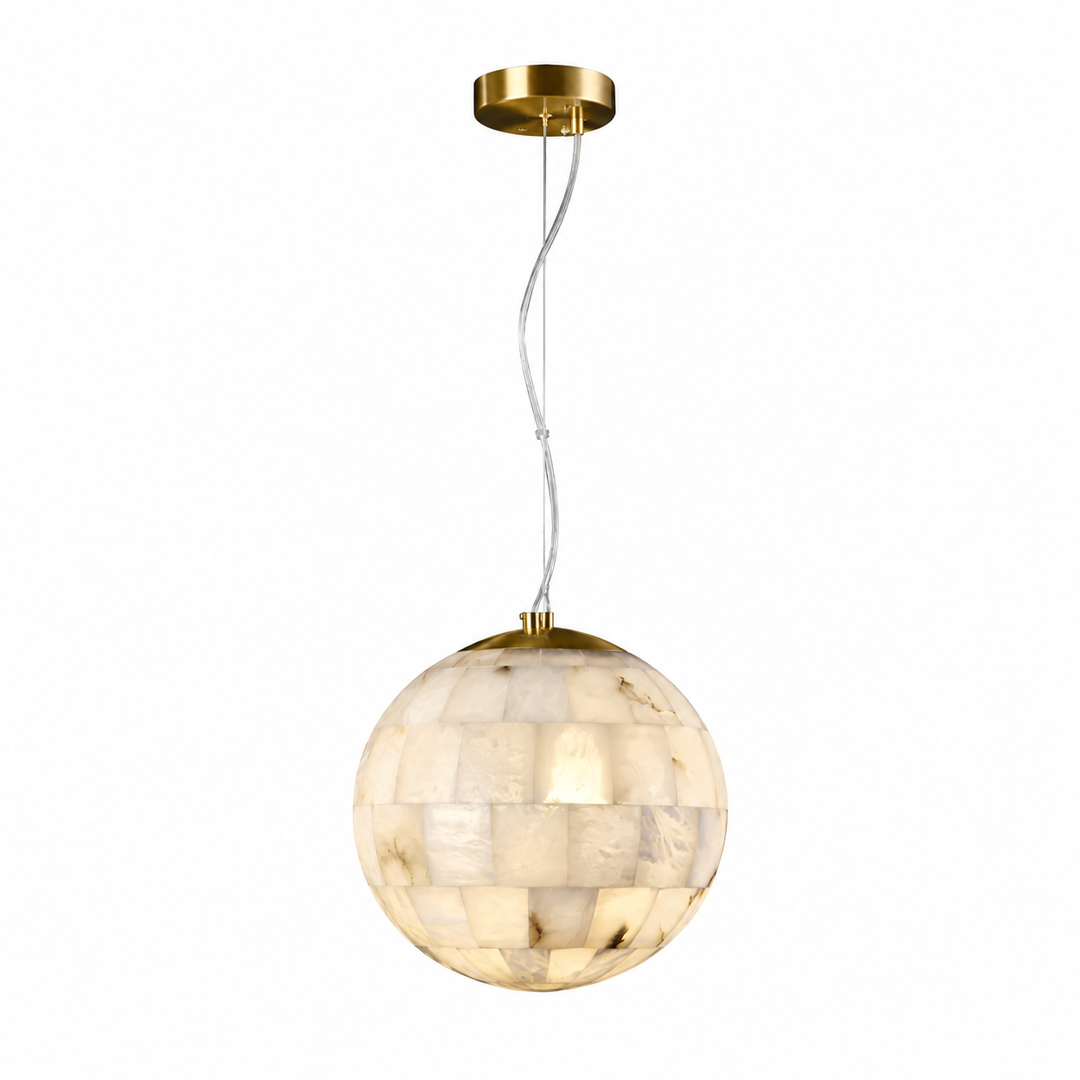 A modern pendant light with a spherical shell-mosaic shade, suspended by a white cord from a gold ceiling canopy against a solid white background.