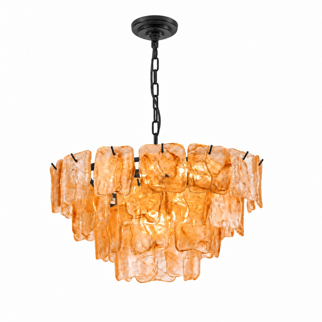 A modern multi-light chandelier with amber-orange textured glass rectangular shades and a black metal canopy, chain, and hangers, shown against a plain white background.