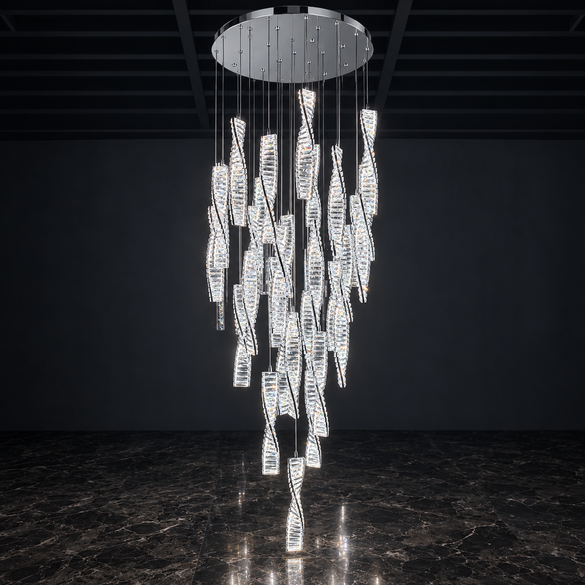 A modern multi-light chandelier with clear twisted glass pendants suspended from a circular chrome ceiling canopy, shown hanging in a dark interior with a polished marble floor.