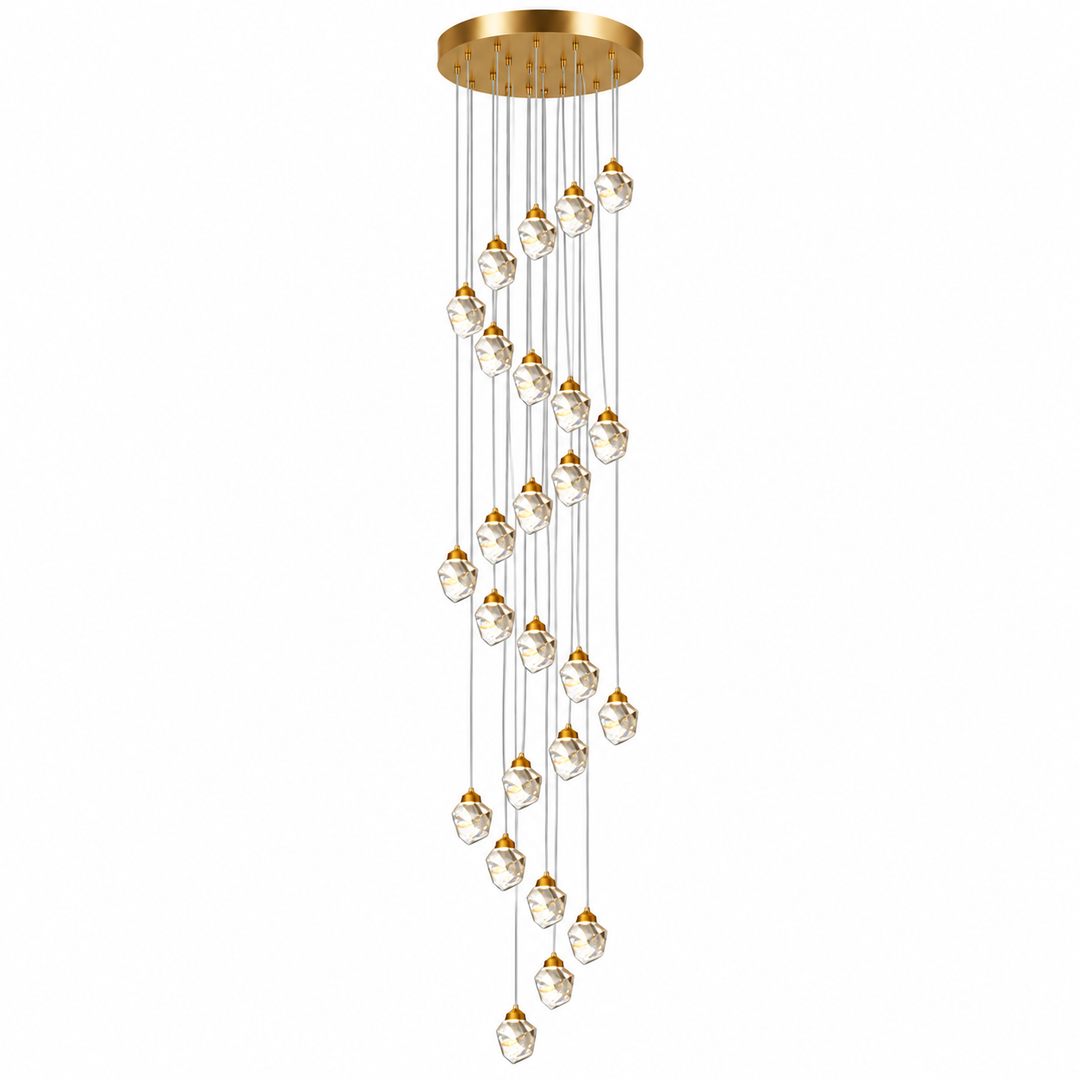 A modern multi-light linear chandelier with a brushed gold circular ceiling canopy and multiple clear faceted glass globe bulbs suspended in a cascading, wavy arrangement on thin metal wires.