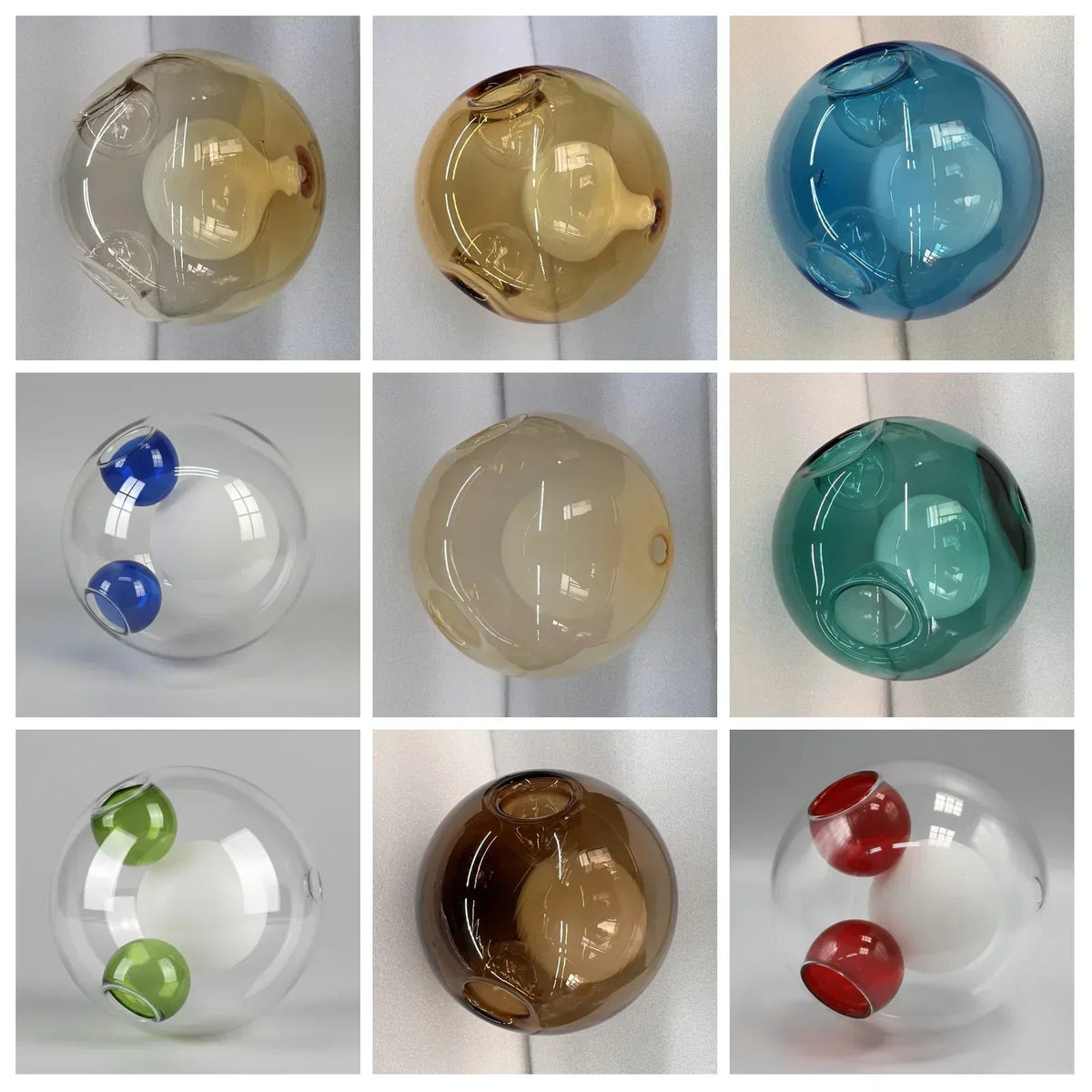 Nine chandelier glass globes in amber, blue, teal and clear finishes appear in a grid, some with contrasting colored openings.