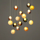 Chandelier with multicolored glass balls on a gray background