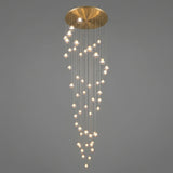 A modern multi-light chandelier with a brushed gold circular ceiling canopy and numerous clear glass spherical bulbs hanging in cascading vertical strands against a solid gray background.