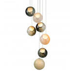 Chandelier with multicolored glass spheres on a white background