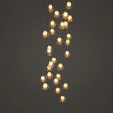 A modern multi-light cluster chandelier with clear faceted glass globes suspended at varying heights against a dark gray background.