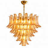 A multi-tiered Murano-style glass chandelier with curved amber-tinted glass shades and a gold-toned metal canopy and chain, shown against a plain white background.