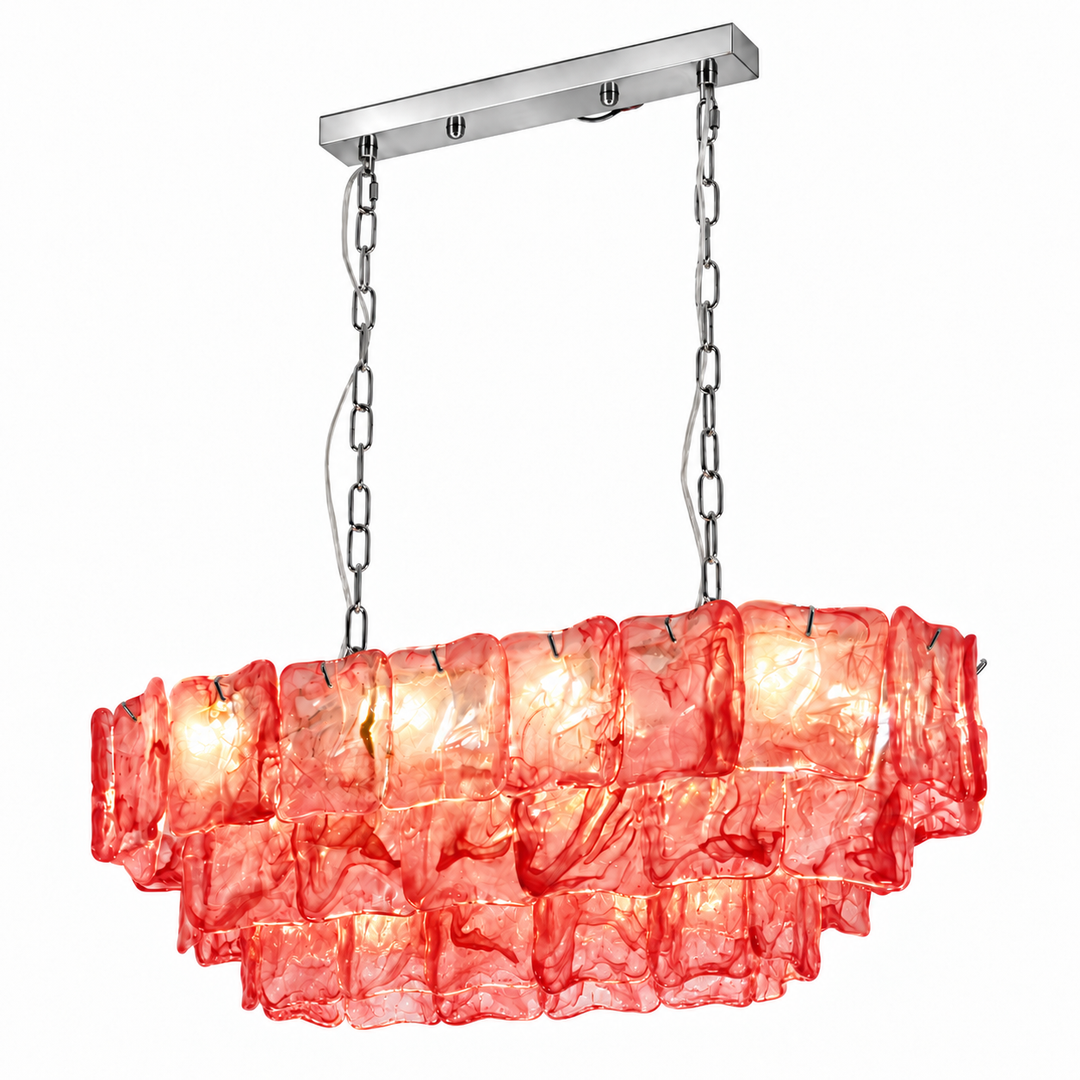 Linear chandelier with three tiers of red textured glass and silver-tone suspension chains against a white background.