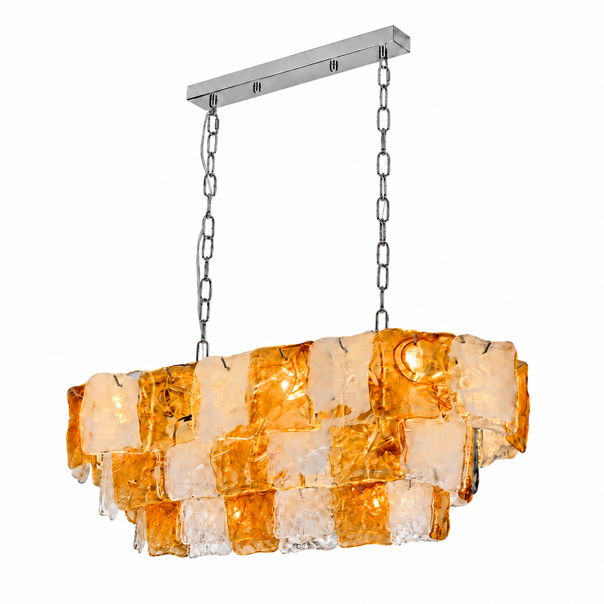 Linear chandelier with tiered amber and clear textured glass panels, silver-toned chains and a matching ceiling canopy against a white background.