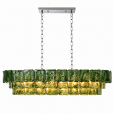 Linear chandelier with three tiers of rippled green glass panels, silver-tone chains and a rectangular canopy against a white background.