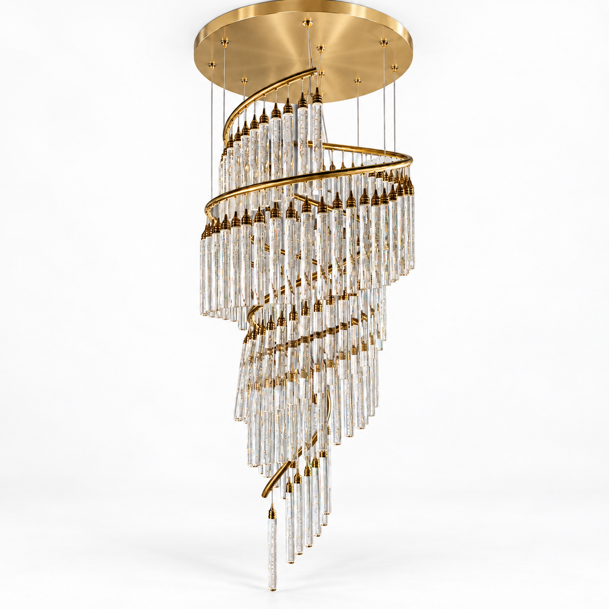 A spiral chandelier with a brushed gold metal frame and clear glass tube pendants, suspended from a matching circular gold ceiling canopy against a white background.