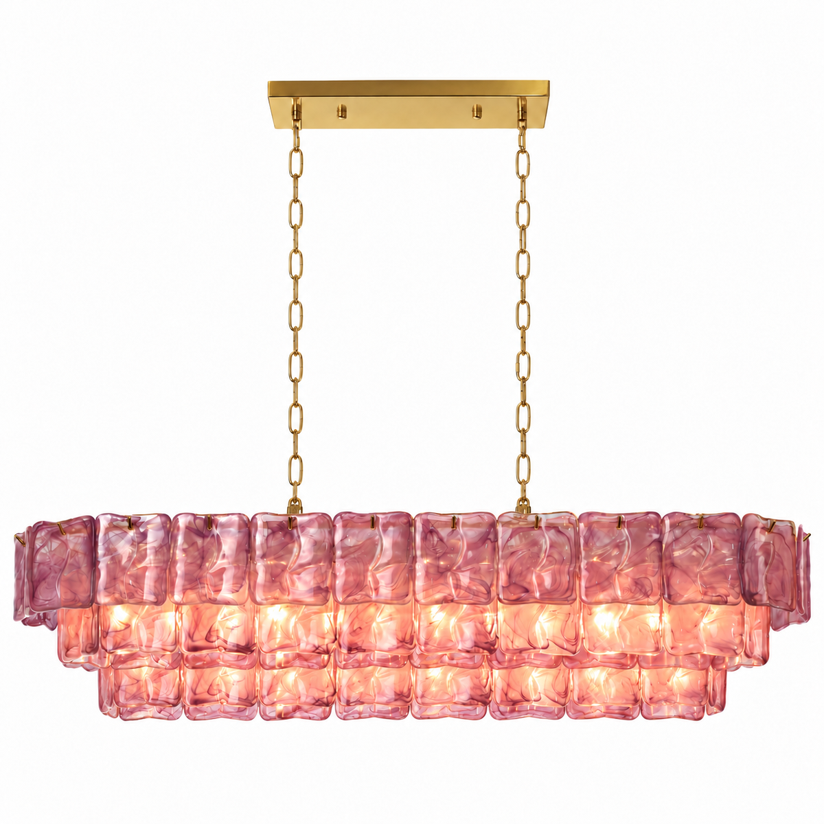 Linear chandelier with three illuminated tiers of rippled pink-purple glass panels, gold-tone chains and a rectangular canopy against white.