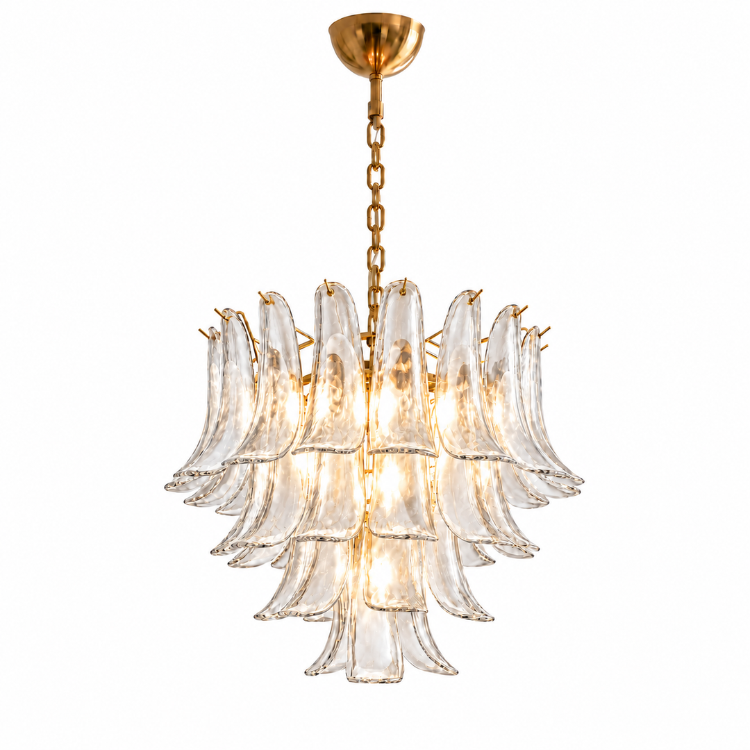 A modern multi-tier chandelier with clear textured glass petal-like shades and a polished gold brass chain and canopy, shown against a solid white background.