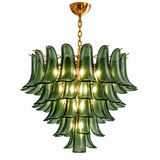 A multi-tiered Murano-style chandelier featuring layered green glass leaf-like shades with a polished gold brass frame, chain, and ceiling canopy, shown against a solid white background.