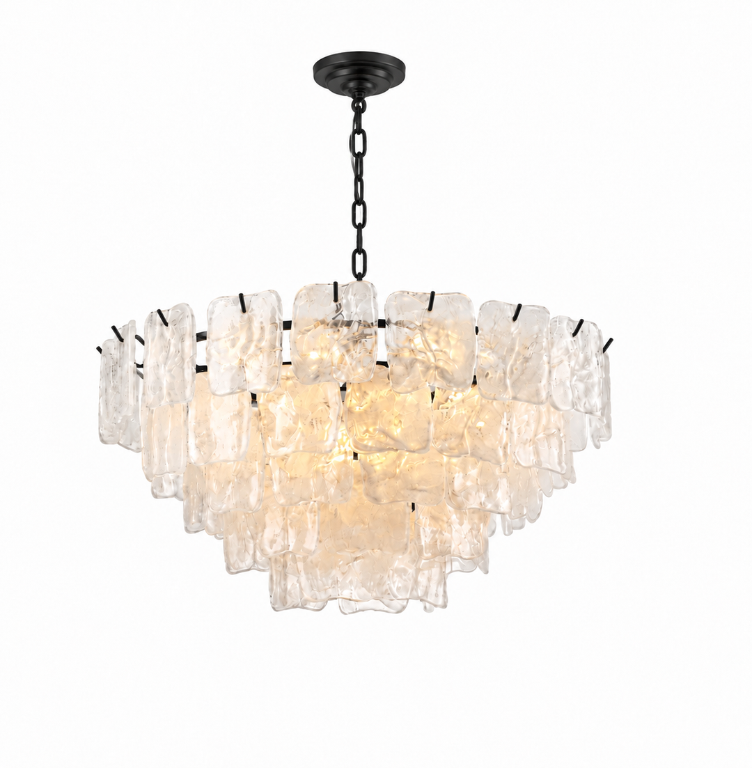 A modern tiered chandelier with textured, wavy clear glass panels and a black metal chain and canopy, shown against a plain white background.