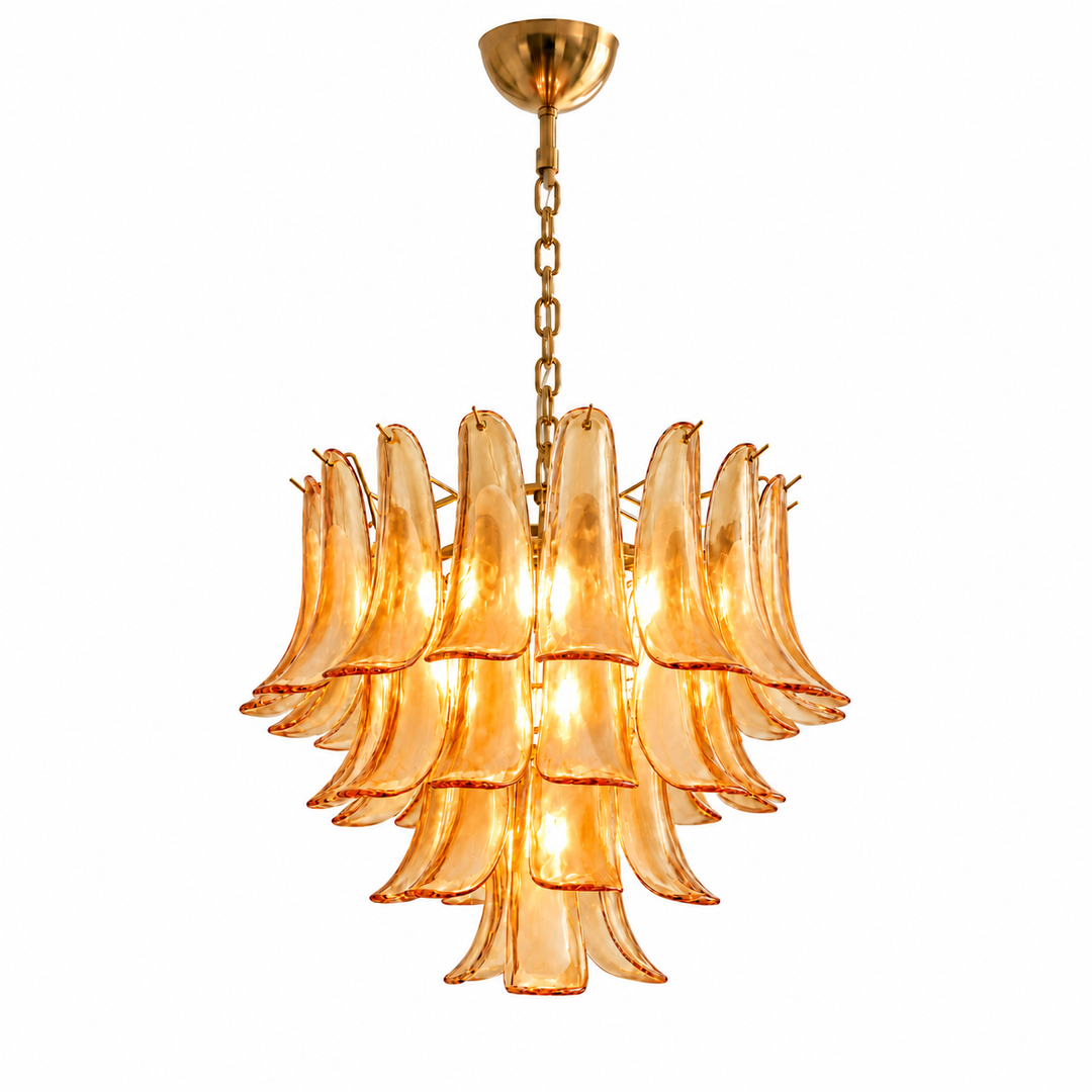 A multi-tiered chandelier featuring curved amber-tinted glass shades suspended from a gold-finished chain and ceiling canopy, shown against a plain white background.