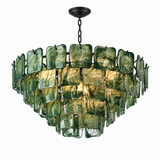A modern multi-light chandelier featuring textured green glass square panels suspended in a tiered circular arrangement on a black metal frame and chain.