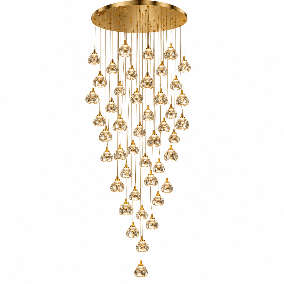 A modern multi-light linear chandelier with a brushed gold circular ceiling canopy and multiple cascading clear glass globe bulbs suspended by gold-toned cords, shown on a plain white background.
