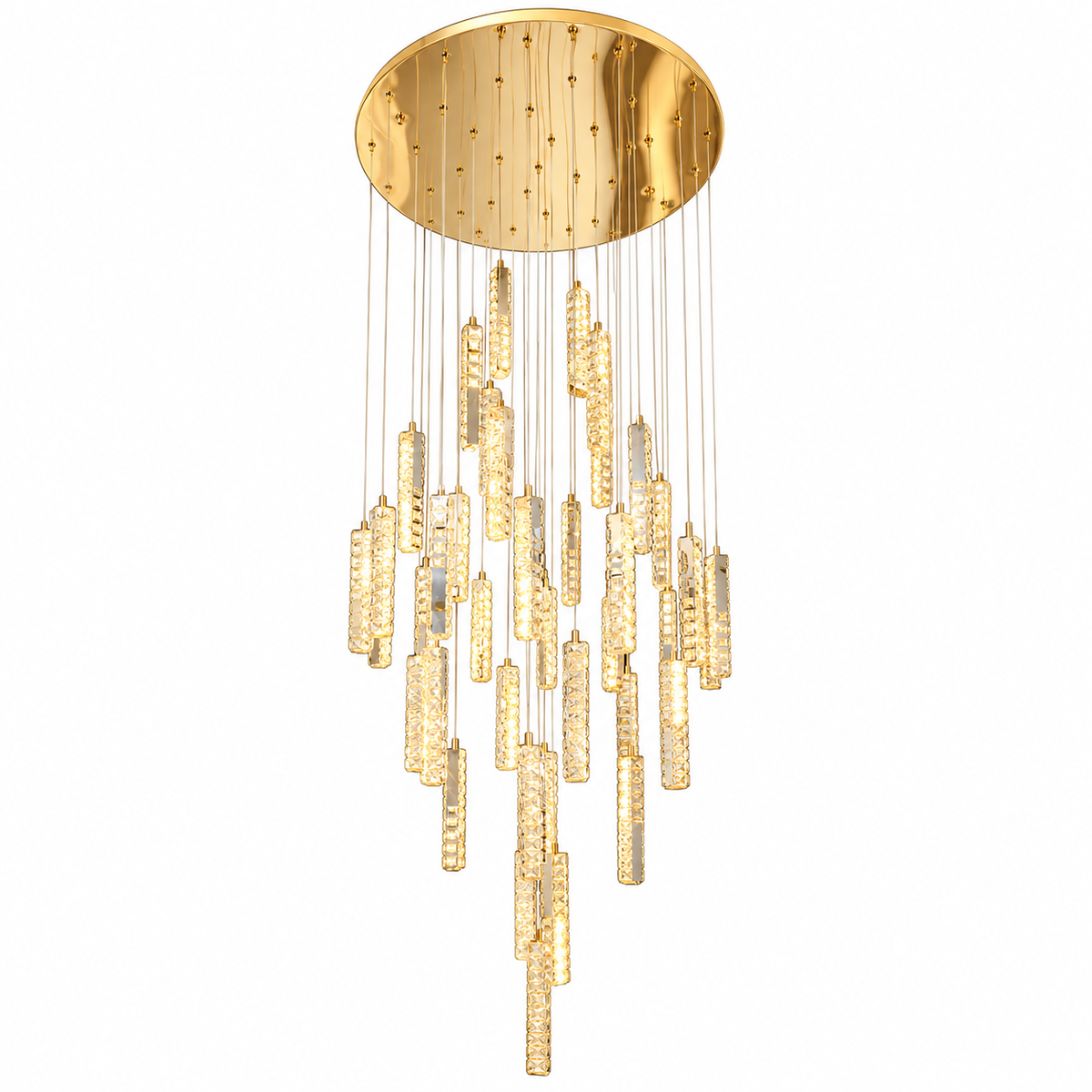 A modern multi-light chandelier with a circular gold canopy, gold-toned metal rods, and numerous clear faceted glass cylinder pendants that glow warm white, shown against a plain white background.