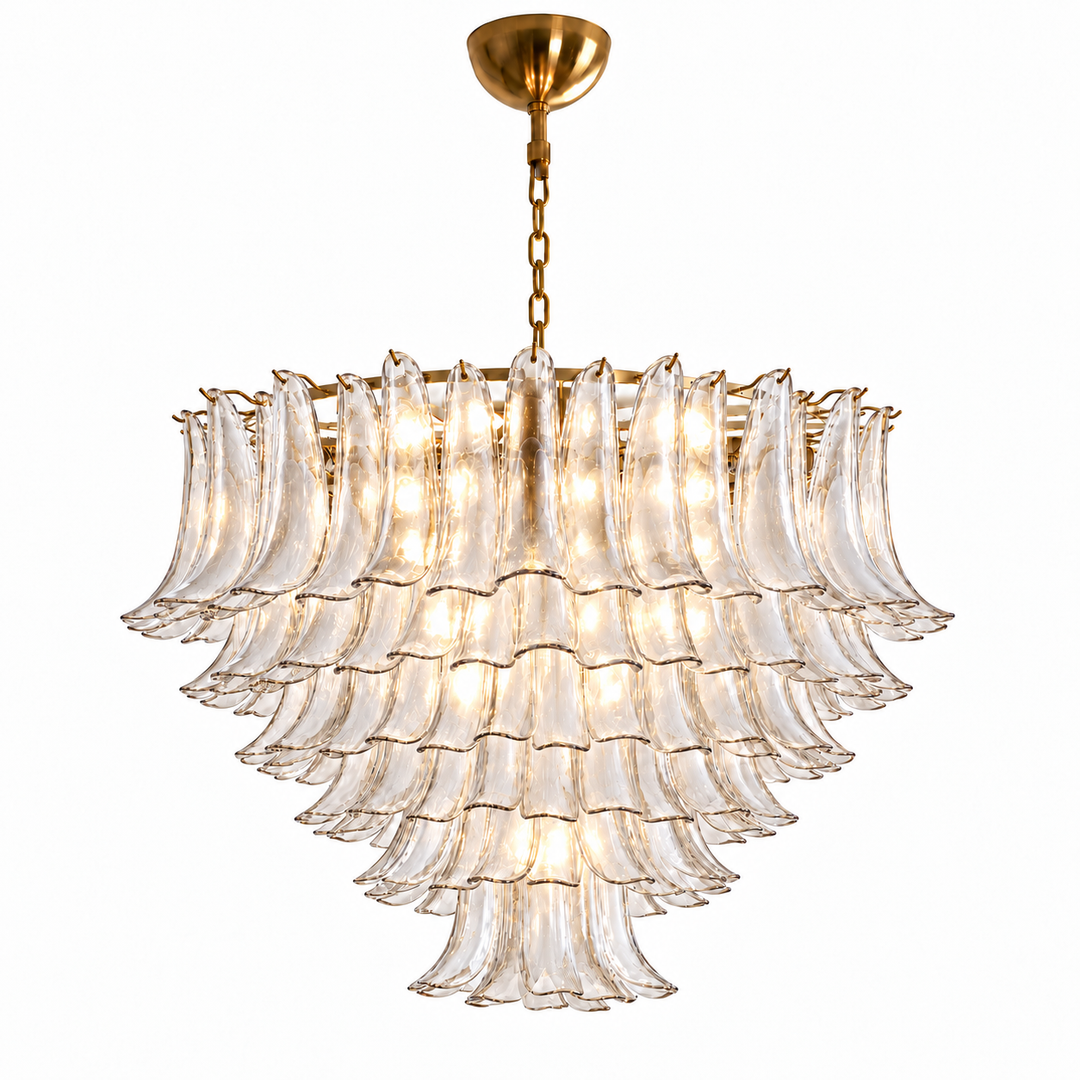 A tiered chandelier with multiple layers of fluted clear glass shades and a brushed gold metal frame, hanging from a matching gold ceiling canopy and chain against a plain white background.