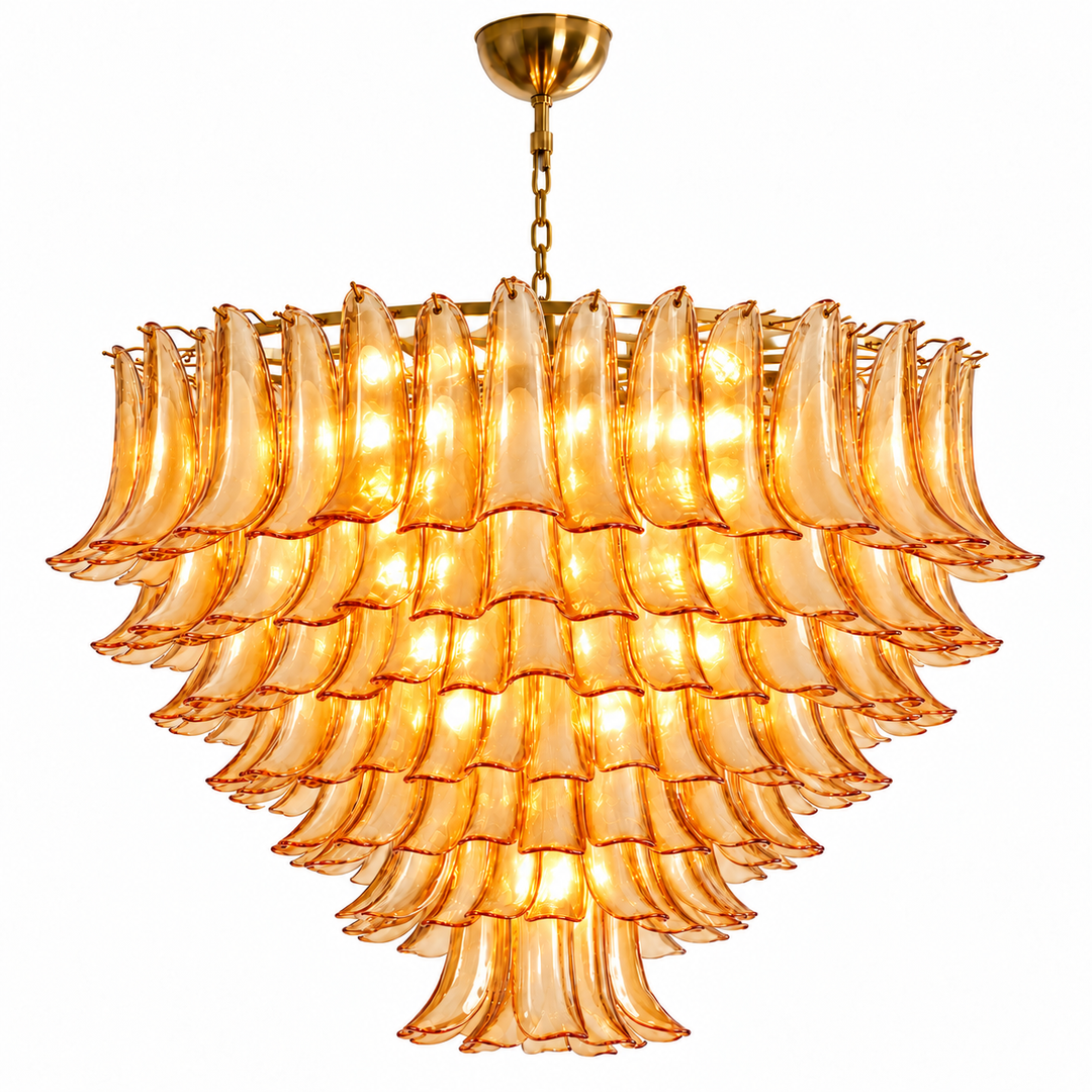 A multi-tiered chandelier featuring curved amber-tinted glass shades suspended from a gold-toned metal frame and chain, shown against a plain white background.