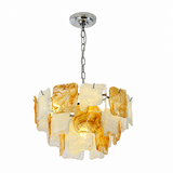 A modern multi-light pendant chandelier featuring translucent amber and cream glass panels suspended from a polished silver-tone chain and ceiling canopy, shown against a plain white background.