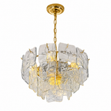 A modern multi-light chandelier featuring clear, textured glass disc plates suspended from a polished gold-toned brass frame and chain.
