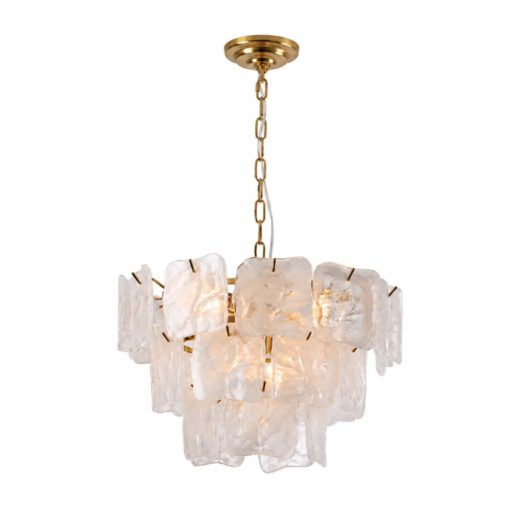 A modern multi-light chandelier featuring textured, irregular clear glass shades suspended from a gold-toned brass frame and chain.