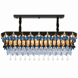 A rectangular chandelier with a black metal frame, blue glass teardrop accents, and cascading clear glass crystal drops, shown against a plain white background.