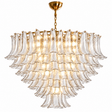 A modern tiered chandelier with clear ribbed glass fluted shades and a brushed gold metal frame, canopy, and chain, shown against a solid white background.